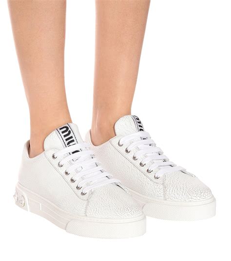 miumiu sneakers for women.